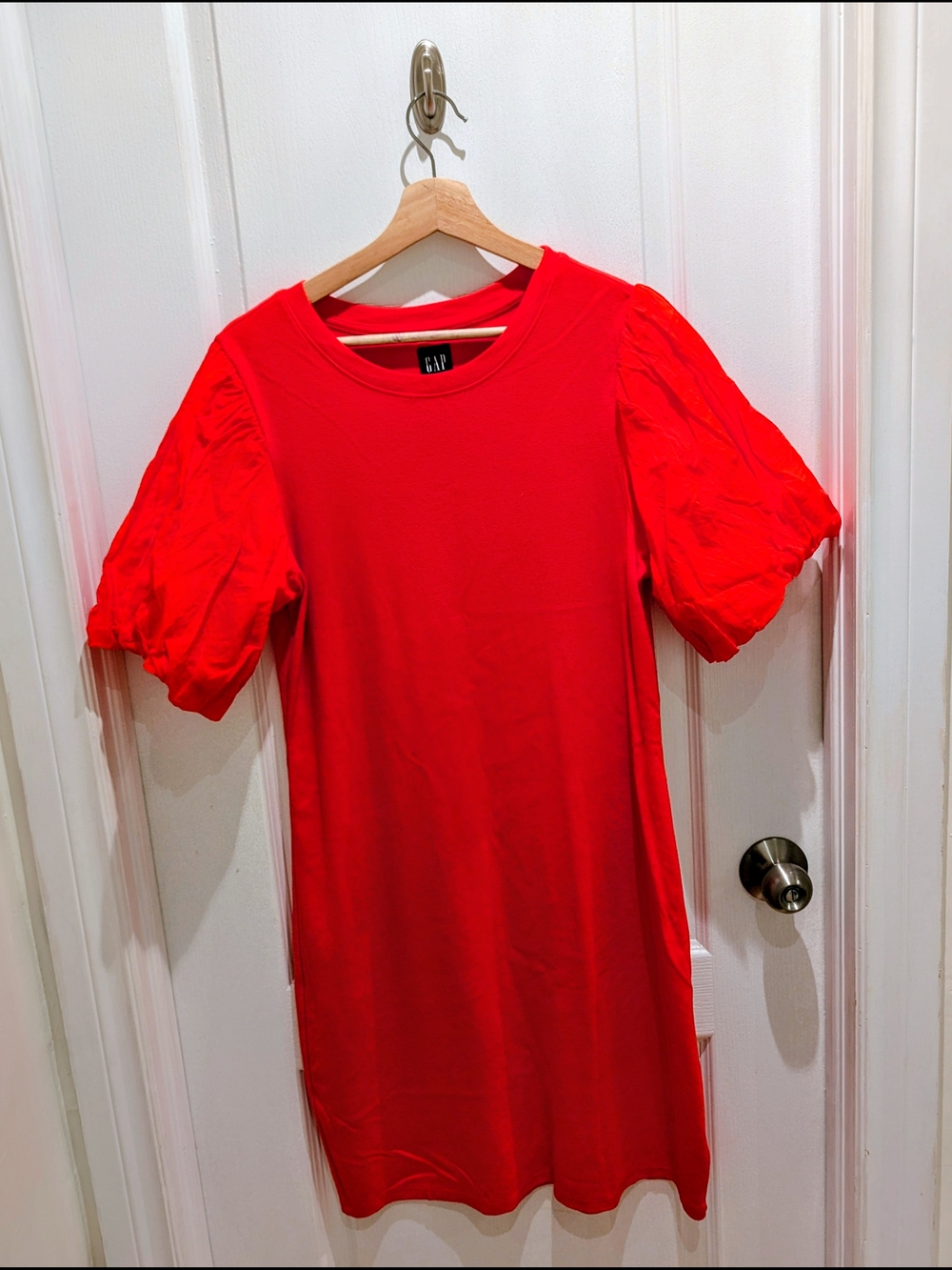 Red crew neck top likely long sleeve tee